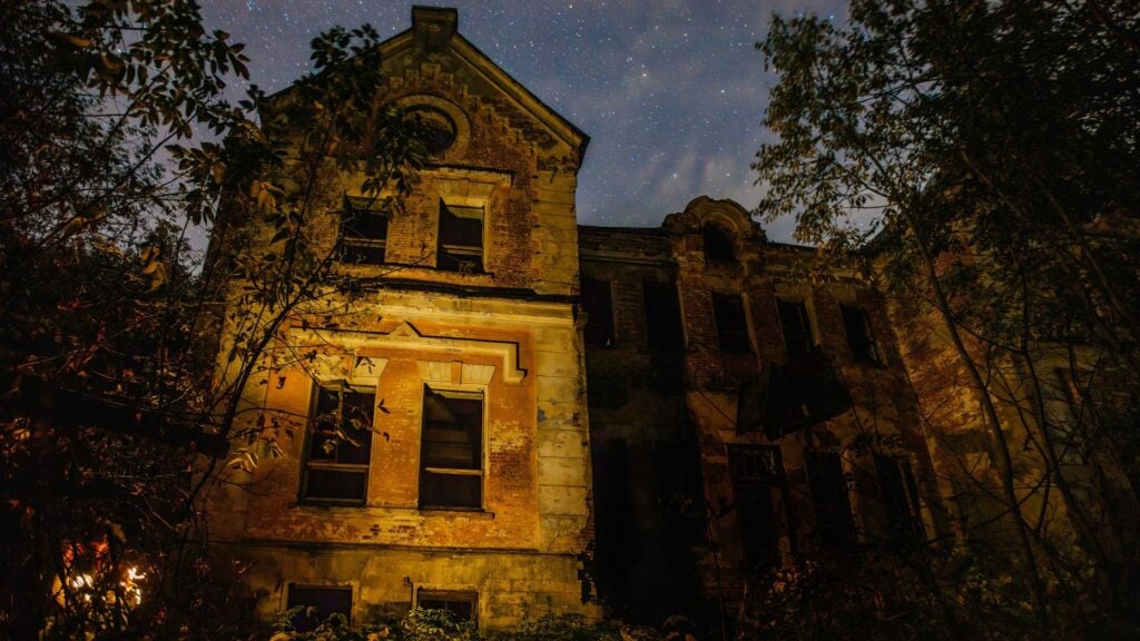 An old brick house underneath the stars