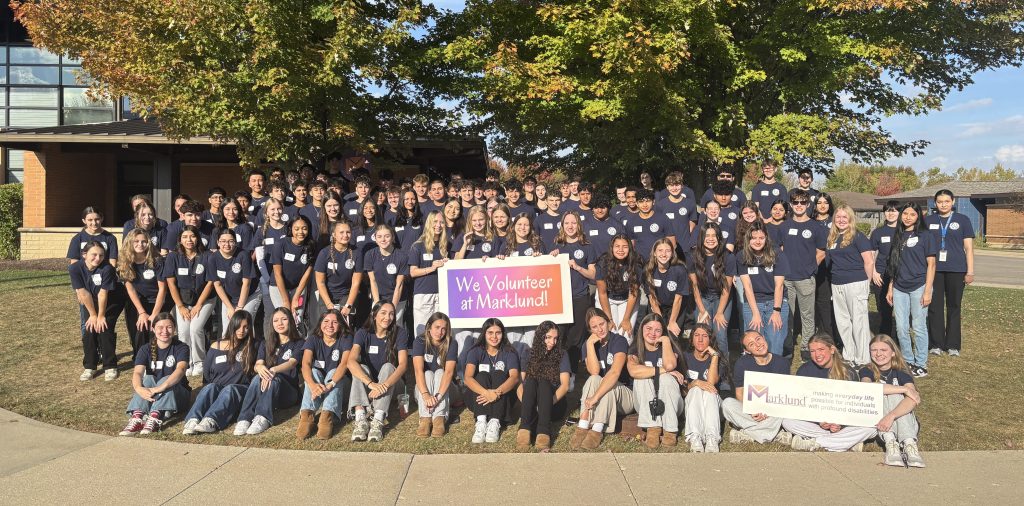 Aurora Central students volunteer at Marklund in Geneva